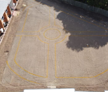 An arial shot of ground cleared and marked out for creating a new garden with paths