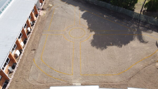 An arial shot of ground cleared and marked out for creating a new garden with paths